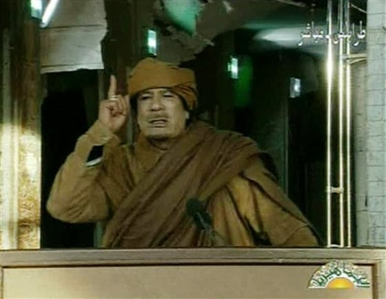 Libyan leader Moammar Gadhafi addresses the nation in Tripoli, Libya on state television Tuesday, Feb. 22. Gadhafi is arming civilian supporters to set up checkpoints and roving patrols around the Libyan capital to control movement and quash dissent, residents said Saturday.
